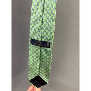 a Brooks Brothers 346 Green Tie -Blue Gold Horsebit Motif-100% silk.